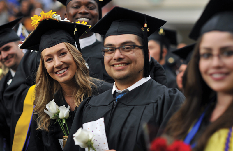 NMHU graduates waiting for commencement